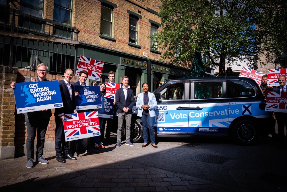 Conservative Party leader Kemi Badenoch and shadow transport secretary Richard Holden in Battersea, south London, on the eve of polling day (James Manning/PA) (PA Wire)