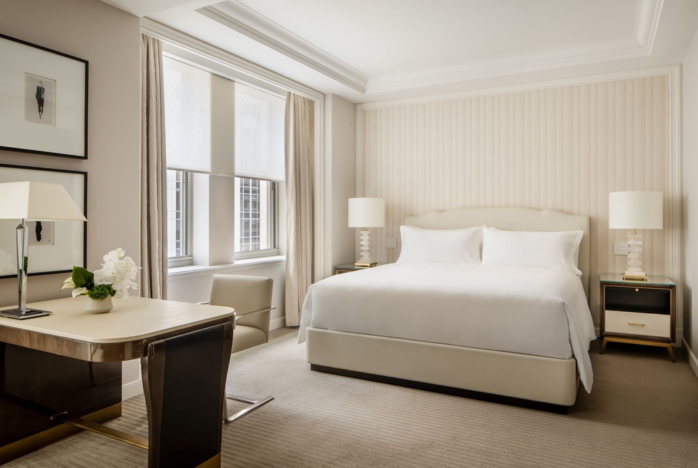 A Junior Suite with a plush king-size bed (Hilton)