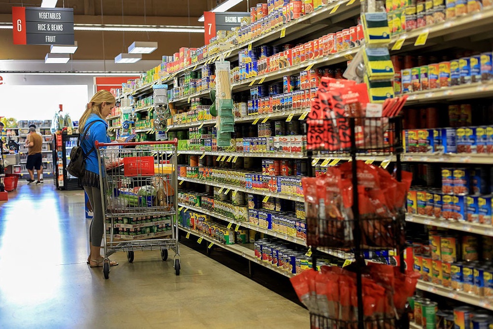 The money shoppers save through some grocery loyalty programs each month could be enough to pay for a tank of gas (Getty Images)