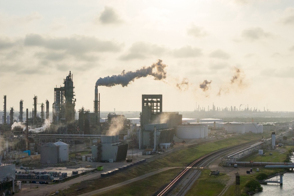Barring US companies from exporting oil abroad would come with a series of risks, including throwing the global economy into a recession. Pictured here is an oil refinery in Corpus Christi, Texas (Getty Images)