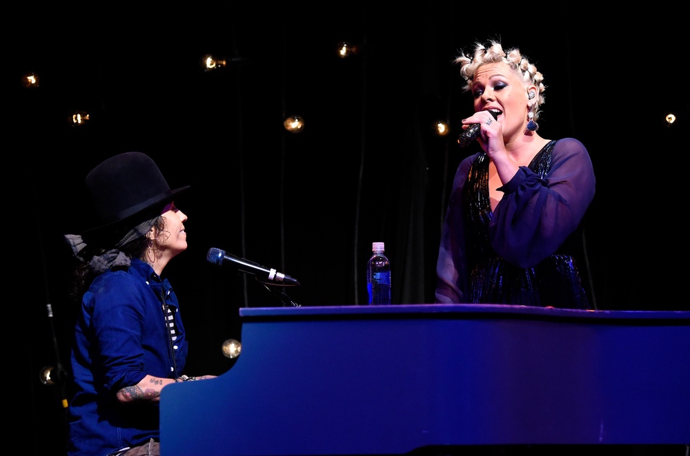 Linda Perry and Pink performing in Los Angeles in 2014. Perry says their 2001 hit ‘Get the Party Started’ was an ‘experiment’ (Getty)