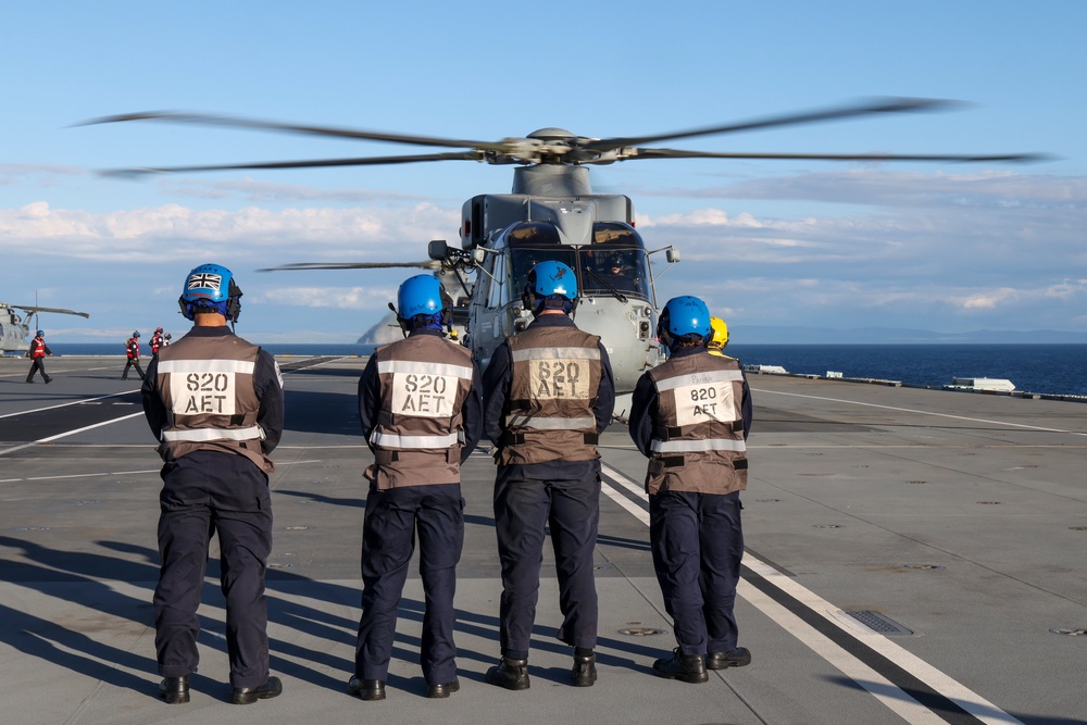 Merlin MK2 Helicopters from 814 and 820 Naval Air Squadron embark on Britain’s flagship HMS Prince of Wales. The ship is currently carrying out Fleet Operational Standards and Training. (Chris Sellars/PA)