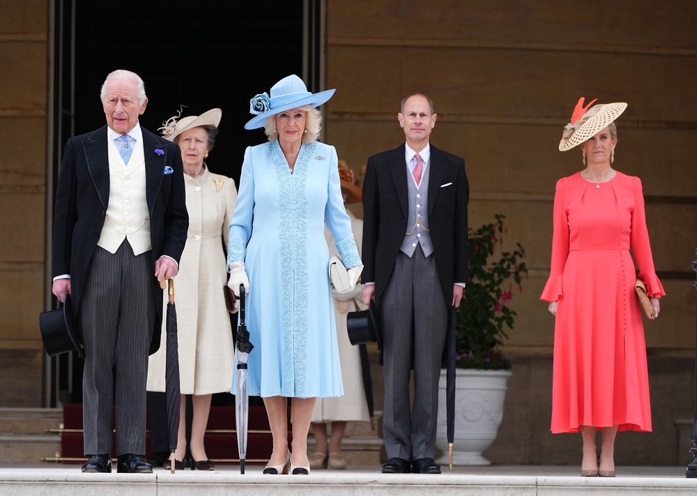 Queen Camilla engaged with representatives at the garden party (PA Wire)