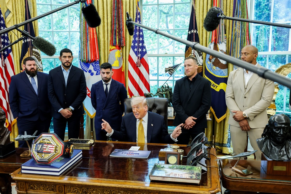 Trump turned to UFC fighter Justin Gaethje (second from right) for his opinion on the U.S. war against Iran on Wednesday (Getty)