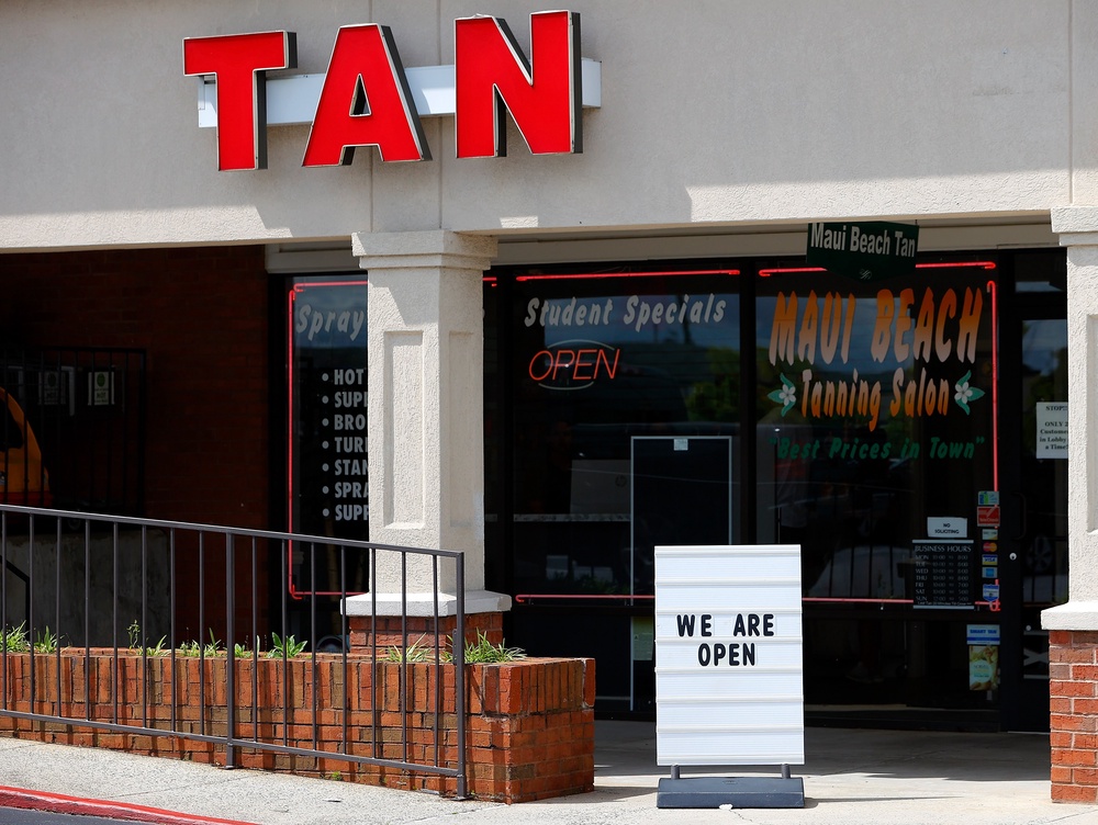 Using tanning beds can triple a person’s risk of melanoma, a skin cancer often linked to sun exposure, according to experts (Getty Images)