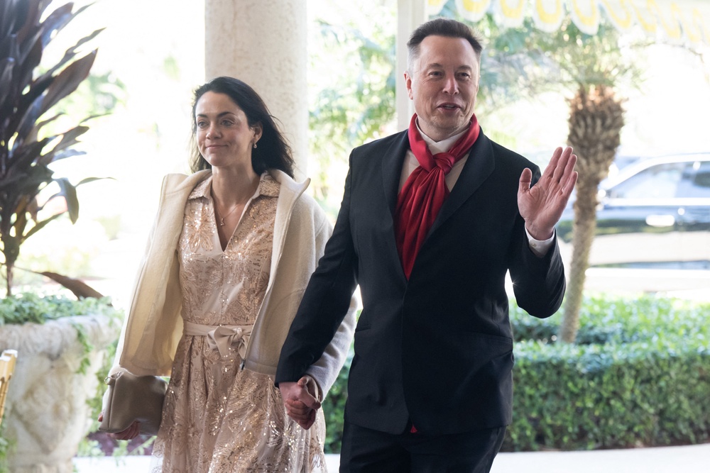 In February, Zilis was photographed holding Musk’s hand as they arrived at Mar-a-Lago (AFP/Getty)