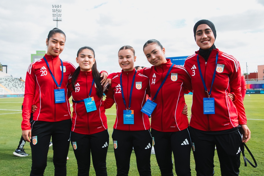 Afghan Women United team players pose before their match against Chad on 26 October 2025 (Fifa)