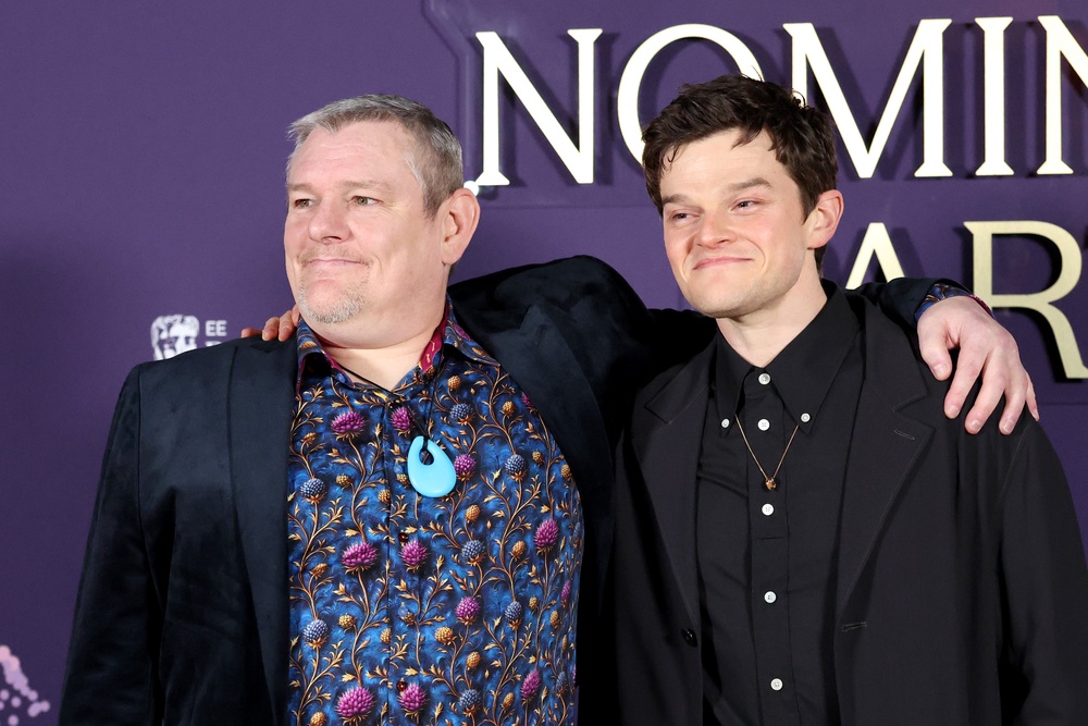 John Davidson with Robert Aramayo, who won a Bafta for playing him on the big screen (Getty)