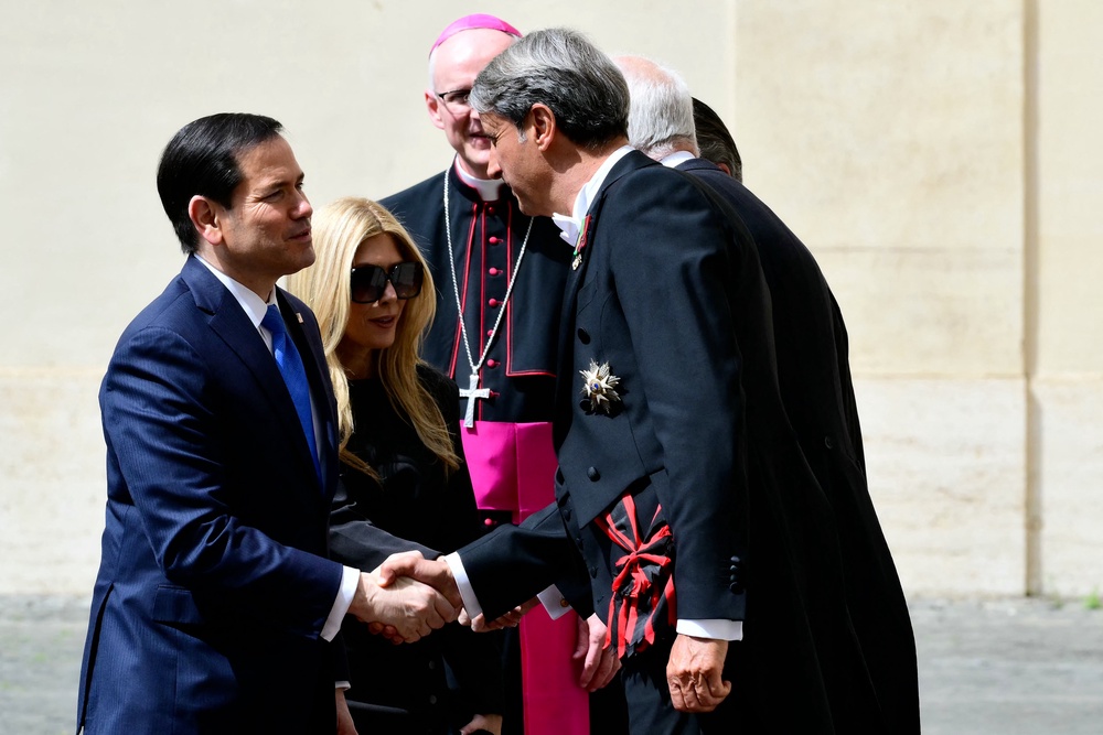 Marco Rubio greets officials as he arrives at San Damaso courtyard in The Vatican prior a private audience with Pope Leo XIV on May 7 (AFP/Getty)