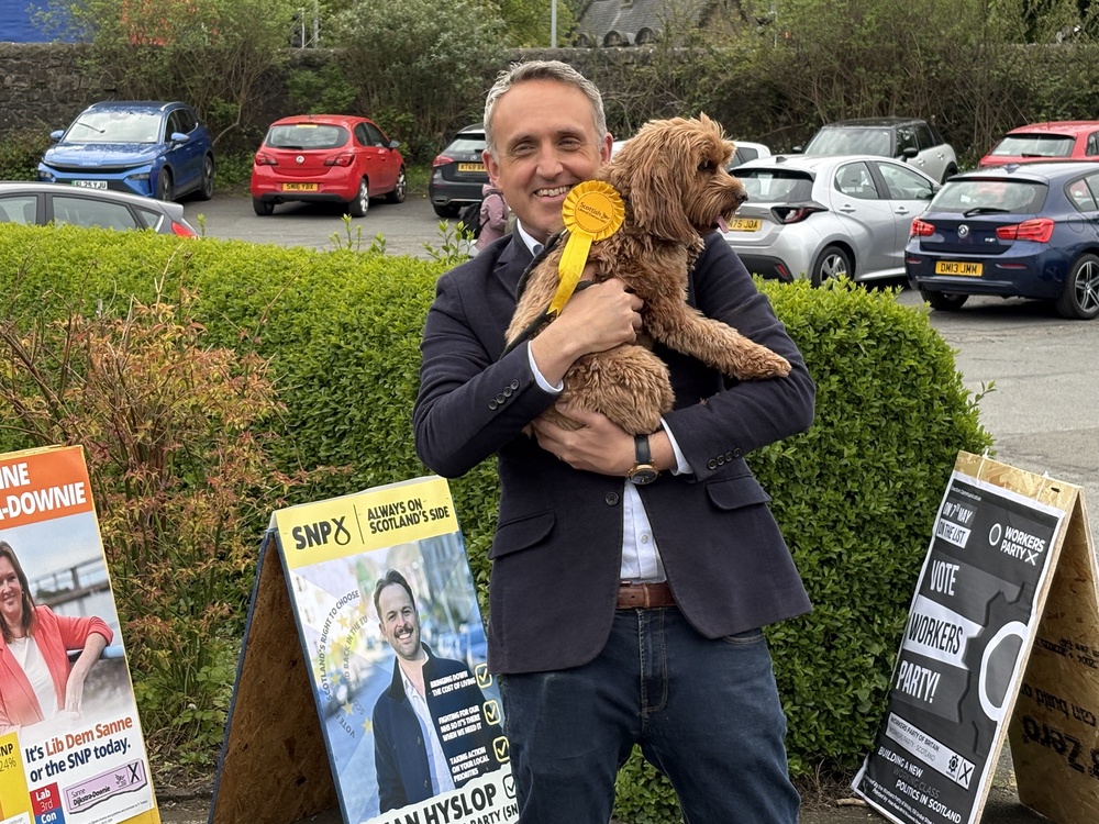 Scottish Liberal Democrat leader Alex Cole-Hamilton was accompanied by his dog Bramble to cast his vote in Edinburgh (Neil Pooran/PA) (PA Wire)
