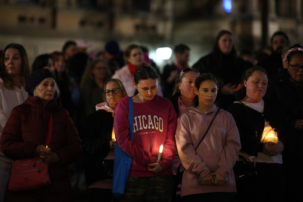 Supporters hold candles as they stand in silence during a vigil in honour of Kumanjayi Little Baby at Town Hall on 7 May 2026 in Sydney, Australia (Getty)
