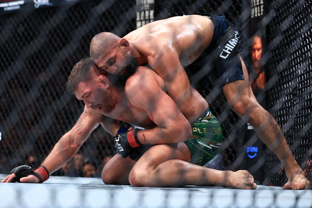 Khamzat Chimaev (right) dominated Dricus Du Plessis to win the UFC middleweight belt (Getty)
