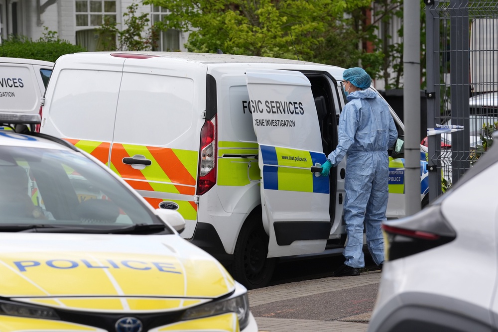 A police forensic officer outside Finchley Reform Synagogue (Lucy North/PA)