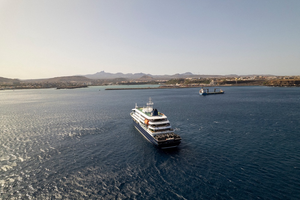 This aerial picture shows a general view of the cruise ship MV Hondius stationary off the port of Praia, the capital of Cape Verde (AFP/Getty)