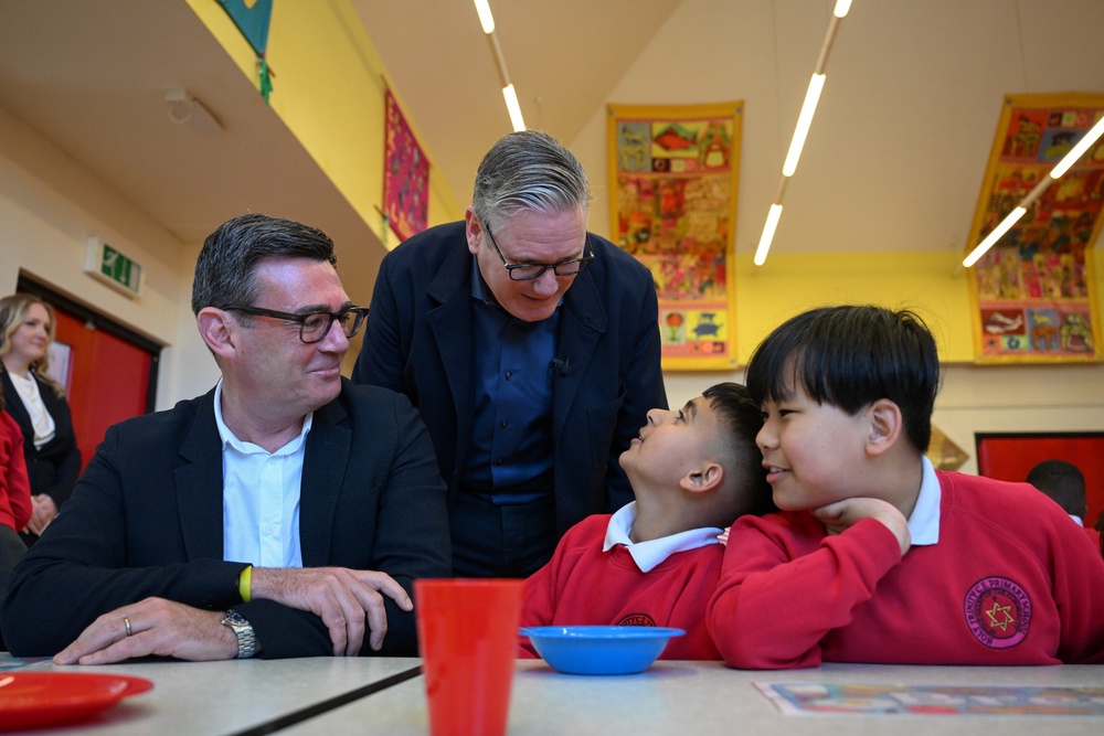 Prime Minister Sir Keir Starmer, accompanied by Greater Manchester Mayor Andy Burnham, during a school visit (Paul Ellis/PA) (PA Wire)