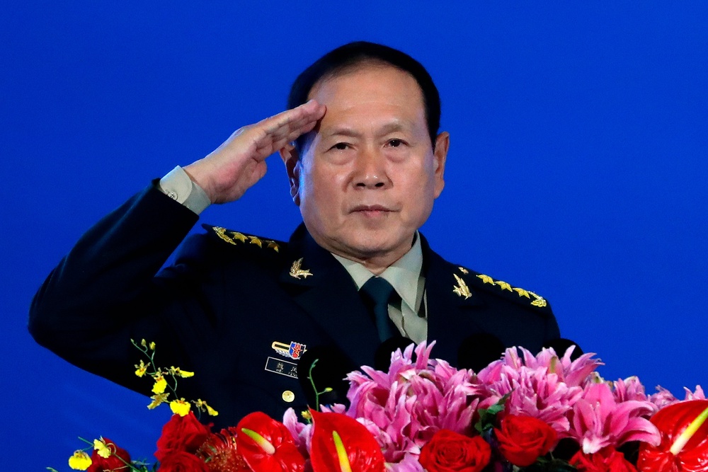 Chinese Defense Minister Wei Fenghe salutes after delivering his opening speech for the Xiangshan Forum, a gathering of the region's security officials, in Beijing, Monday, Oct. 21, 2019. (AP Photo/Andy Wong, File) (Copyright 2018 The Associated Press. All rights reserved)