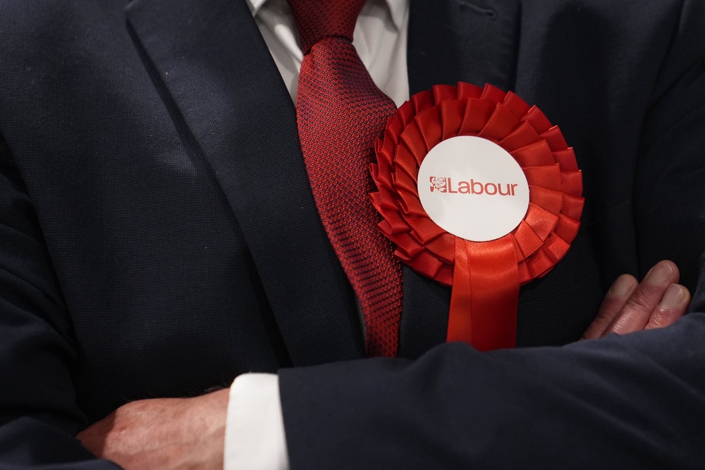 A rosette worn by a Labour Party candidate during the 2026 Essex County Council election at Clacton Leisure Centre in Essex (Joe Giddens/PA)
