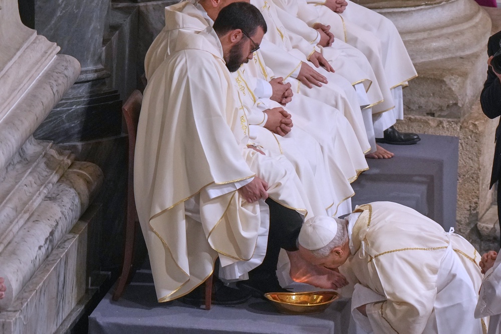 Pope Leo XIV washes and kisses the feet of 12 Roman priests during the Missa in Caena Domini, the Mass of the Lord's Supper, on Catholic Holy Thursday in St. John Lateran Basilica in Rome, Thursday, April 2, 2026. (AP Photo/Andrew Medichini, File) (2026 Copyright The Associated Press)