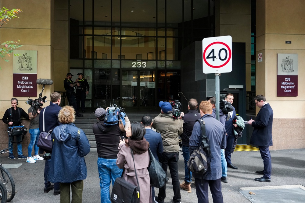 A general view as media wait outside the Melbourne Magistrates court on 8 May 2026 in Melbourne, Australia. The women, who had traveled to Syria to join the Islamic State militant group, are expected to face questioning by Australian Federal Police upon their arrival, with authorities weighing potential charges under counter-terrorism legislation. (Photo by Asanka Ratnayake/Getty Images) (Getty)