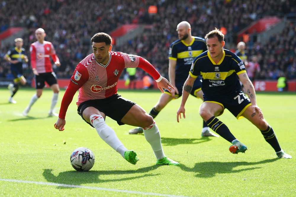 Che Adams of Southampton is challenged by Lukas Engel of Middlesbrough (Getty)