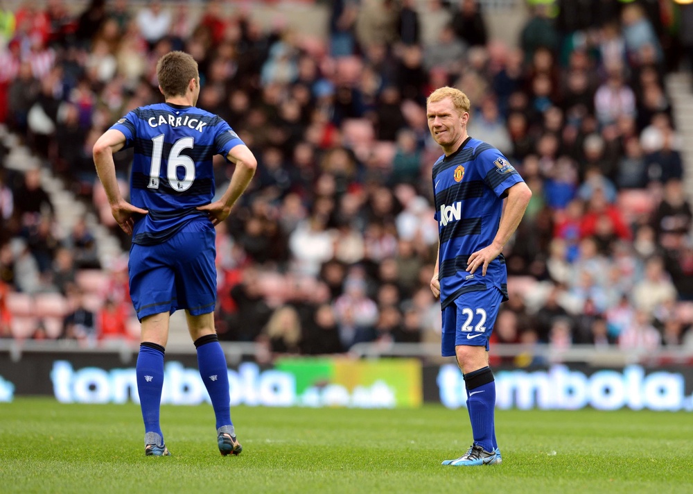 Manchester United’s Michael Carrick and Paul Scholes, right, stand dejected at the Stadium of Light after news of Manchester City’s late title-winning goal in 2012 (Owen Humphreys/PA) (PA Archive)