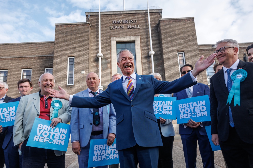 Nigel Farage celebrates Reform taking Havering council (Getty)