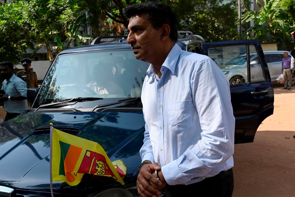 Former Sri Lankan Airlines chief Kapila Chandrasena arrives at a court following his arrest in Colombo (AFP via Getty)