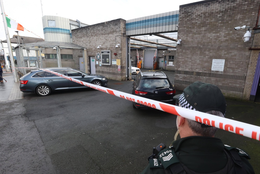 A white Audi car parked inside the police station in Lurgan (PA) (PA Wire)