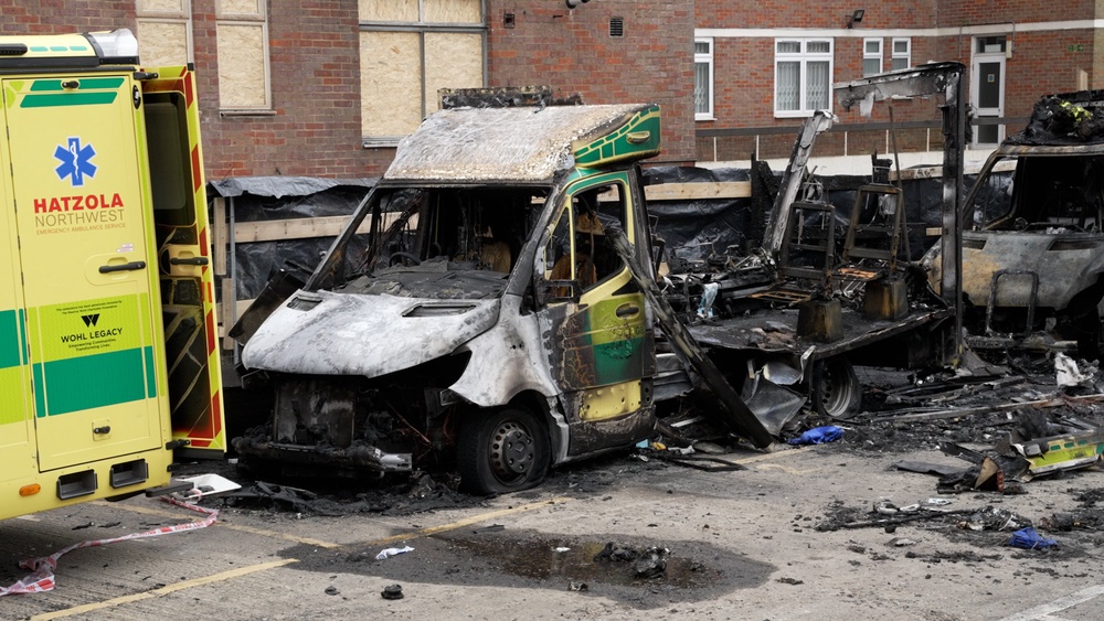 Four ambulances were set alight in Golders Green (PA)