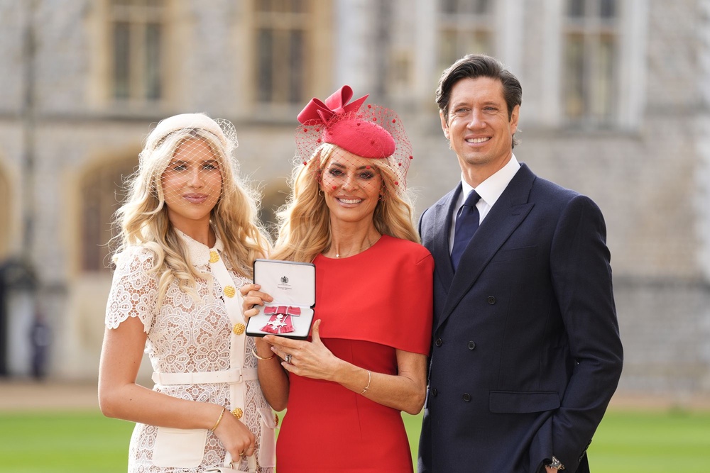 Tess Daly and Vernon Kay with their daughter Phoebe (PA)