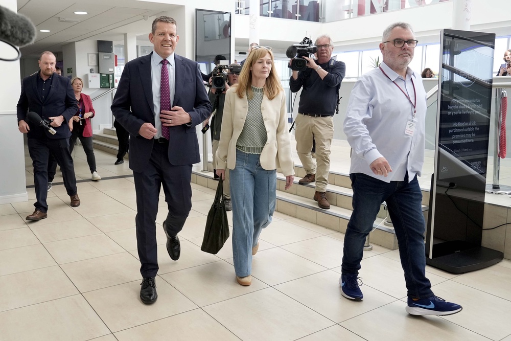 Leader of Plaid Cymru, Rhun ap Iorwerth, and his wife, Llinos, arrive at the counting centre for the 2026 Senedd elections (Peter Byrne/PA) (PA Wire)