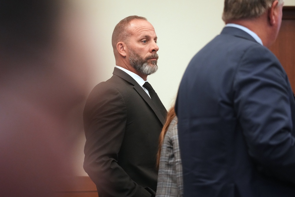Former sheriff's deputy Jason Meade stands during closing arguments of his retrial (AP)