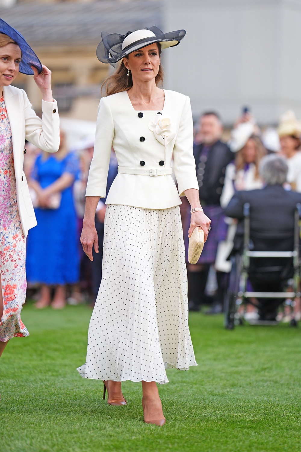Kate was wearing a Self Portrait dress and a vintage hat at the garden party (Aaron Chown/PA) (PA Wire)