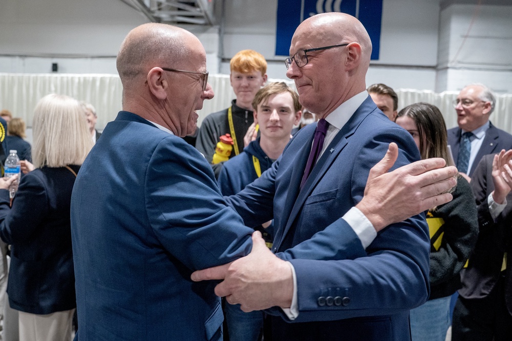 SNP leader John Swinney (right) after he was re-elected in his Perthshire North constituency and Jim Fairlie (left) after retaining his Perthshire South and Kinross-shire seat at the election count for the 2026 Holyrood elections (PA) (PA Wire)