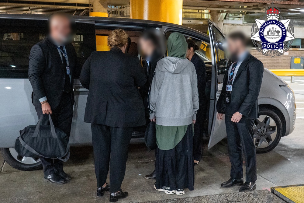 A 32-year-old woman arrived in Sydney from Syria on Thursday and was arrested soon after (Australian Federal Police)