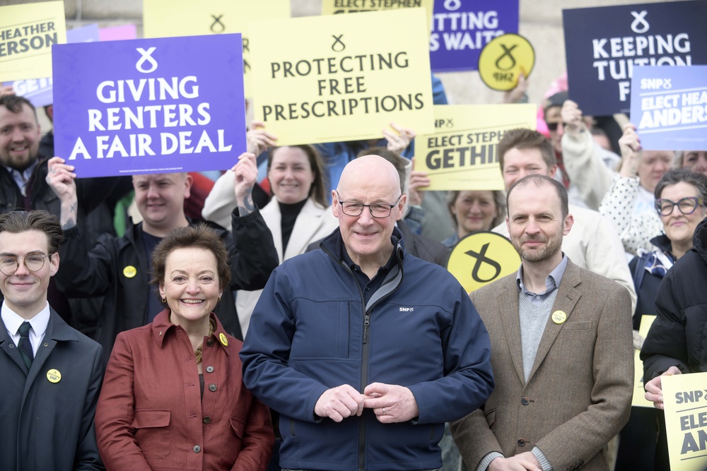 (SNP MSP Stephen Gethins (right) urged First Minister John Swinney (centre) to focus on pursuing Scottish independence. (Mike Boyd/PA)