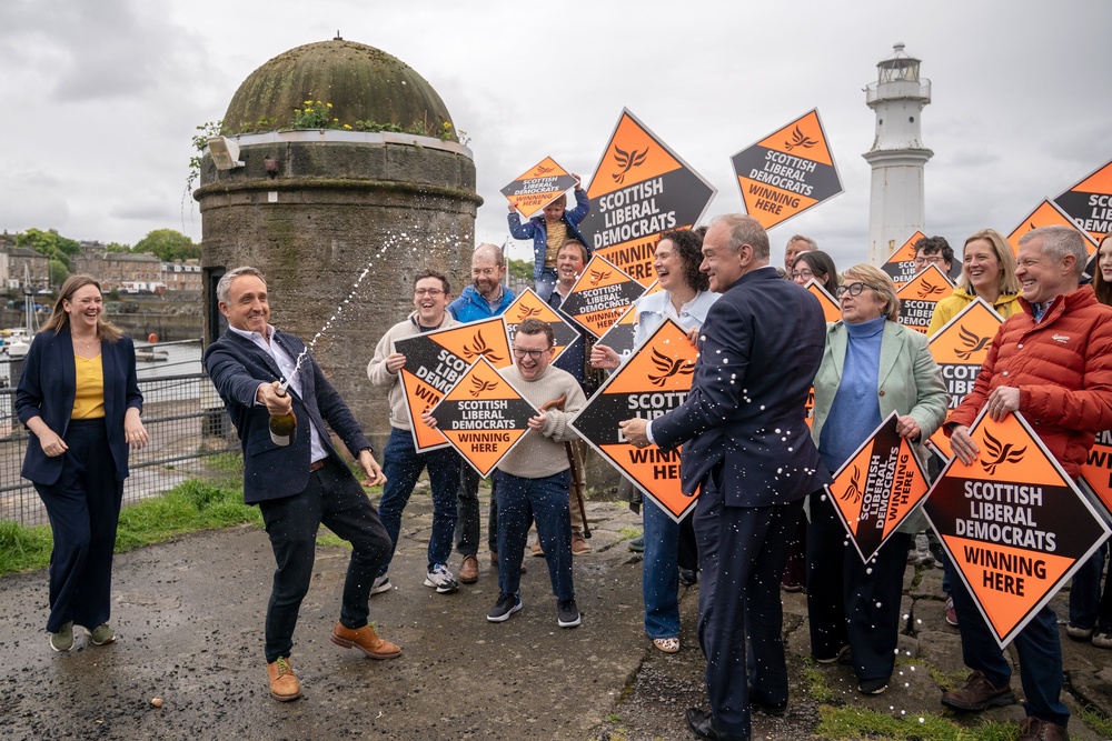 Scottish Liberal Democrats celebrate their Holyrood election success (Jane Barlow/PA) (PA Wire)