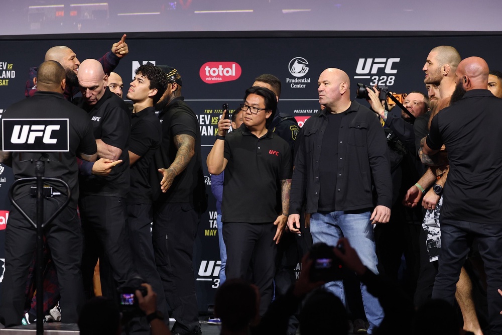Chimaev (left) and Strickland being held back from one another at their pre-fight press conference (Zuffa LLC)