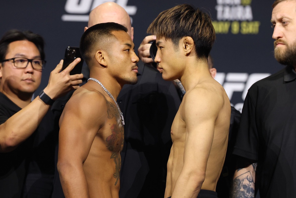 Joshua Van (centre-left) will defend his UFC flyweight title versus Tatsuro Taira (Zuffa LLC)