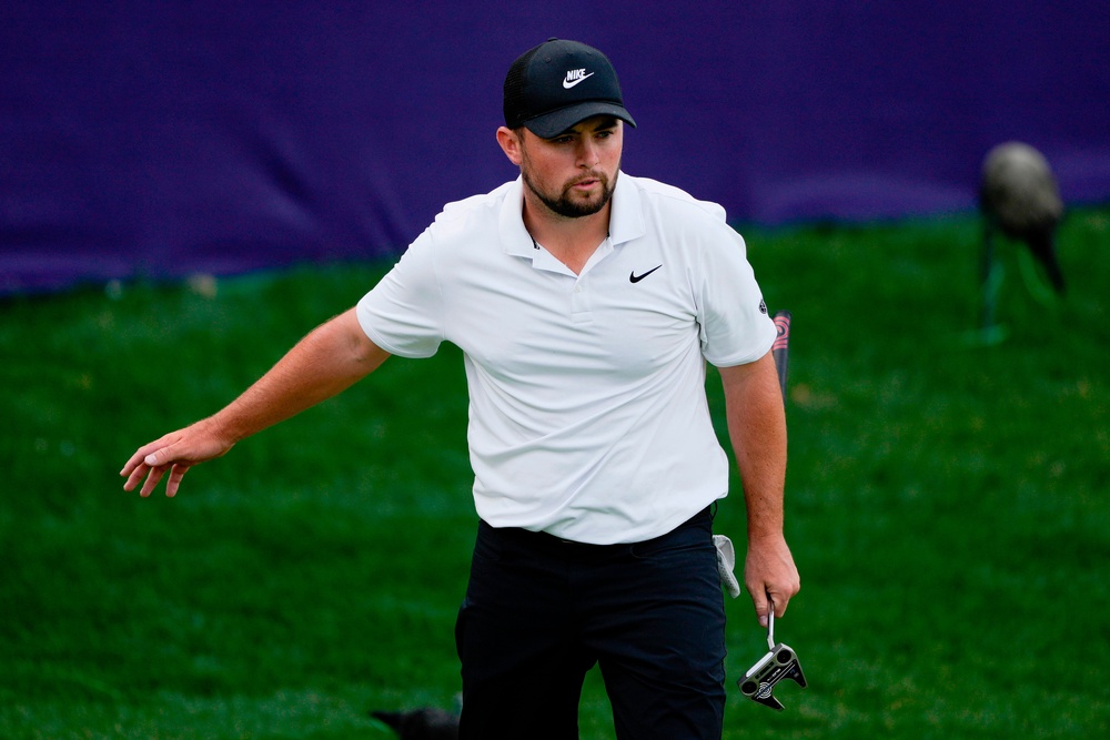 Alex Fitzpatrick follows his putt on the 15th green (Chris Carlson/AP) (AP)