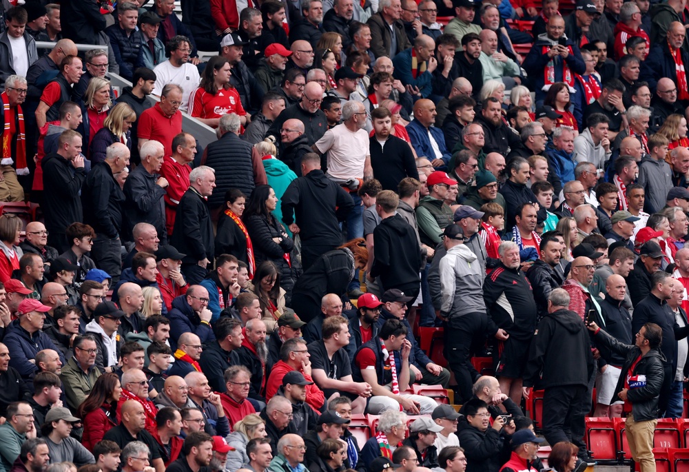 Liverpool fans leave Anfield during the 1-1 draw with Chelsea (Getty)