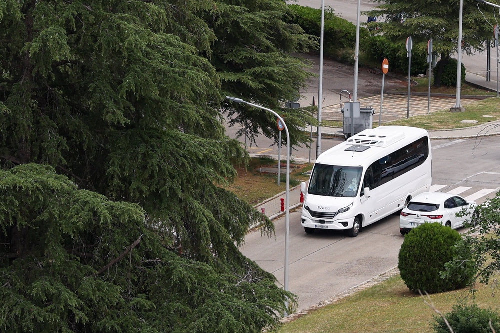 A bus carrying the passengers was seen entering the hospital (Reuters)