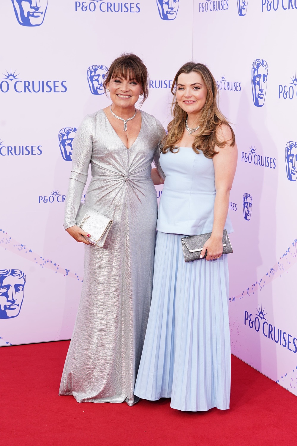 Lorraine Kelly (left) and Rosie Smith in icy spring shades (PA)