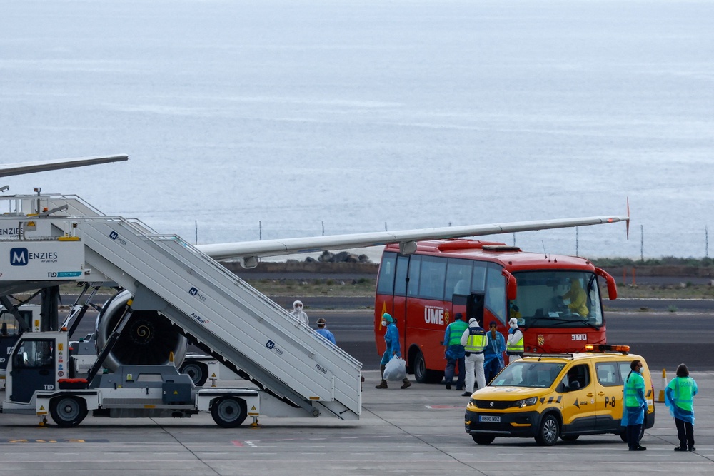 Passengers of the cruise ship MV Hondius, which was affected by a hantavirus outbreak, board a plane bound for Britain at Tenerife Sud airport (Reuters)