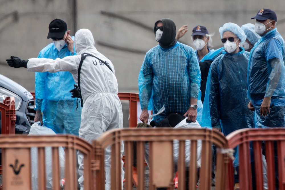 People arrive onshore after being evacuated from the MV Hondius after docking in the Granadilla Port on May 10, 2026 in Tenerife, part of the Canary Islands, Spain (Getty)