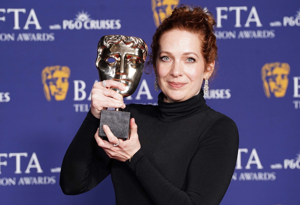 Katherine Parkinson with her Bafta (PA)