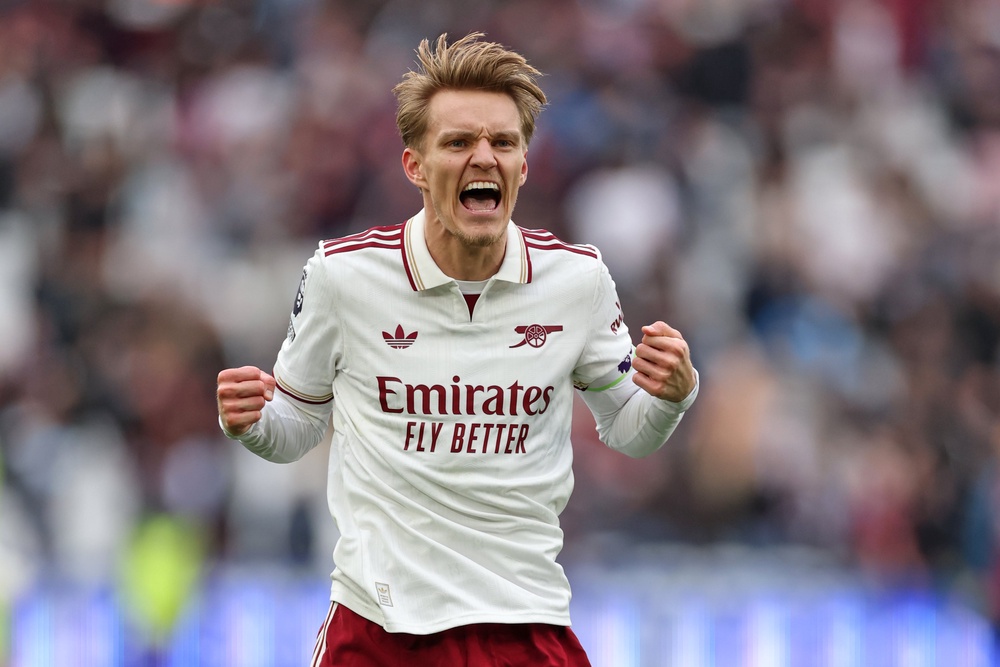 Martin Odegaard made a crucial impact to take Arsenal closer to the title (AP)