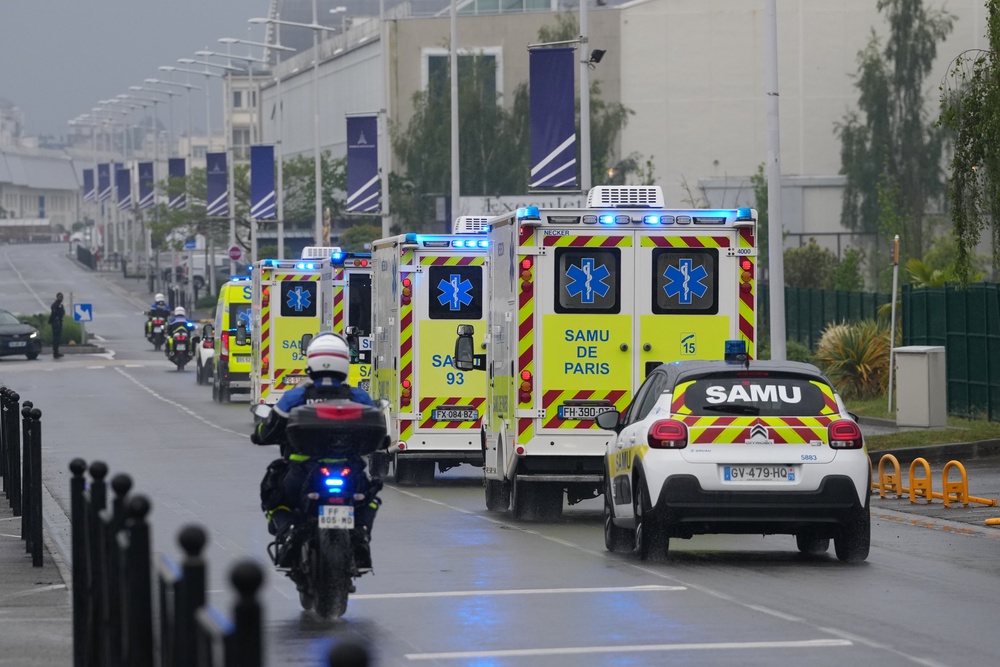 Ambulances carry patients evacuated from the MV Hondius (Thibault Camus/AP) (AP)