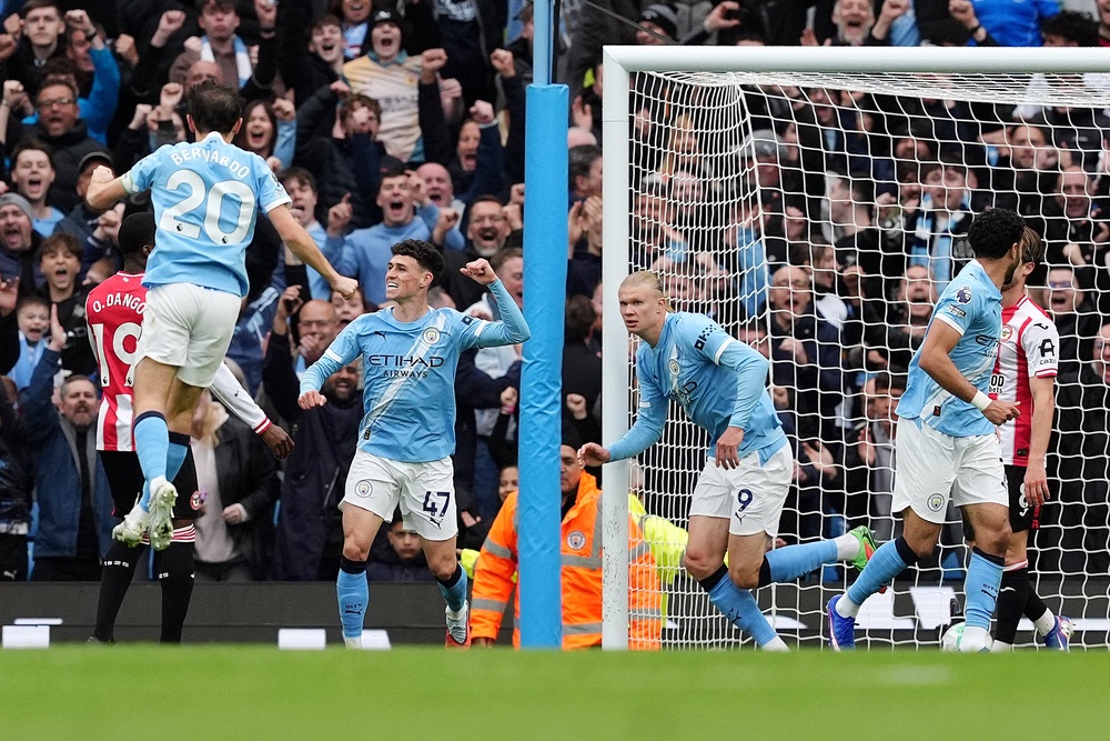 City continued their pursuit of Arsenal with victory over Brentford on Saturday (Martin Rickett/PA) (PA Wire)