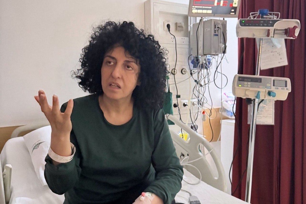 Prominent Iranian human rights activist Narges Mohammadi in a hospital in Tehran, Iran (AP)